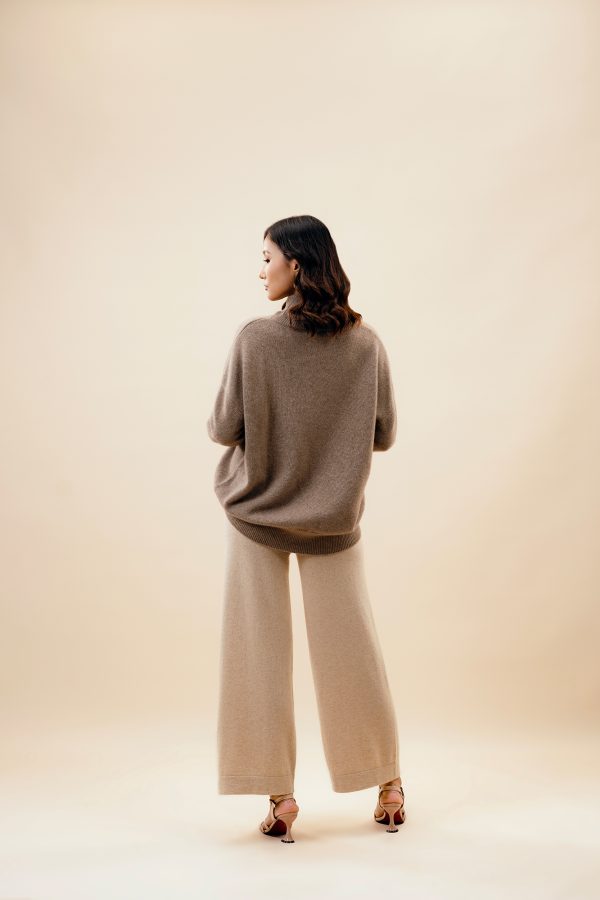 10 Ноолууран свитер