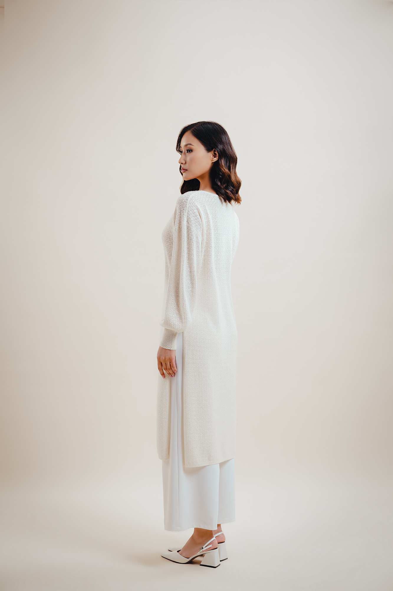 Өндөр оноотой ноолууран платье - Image 3